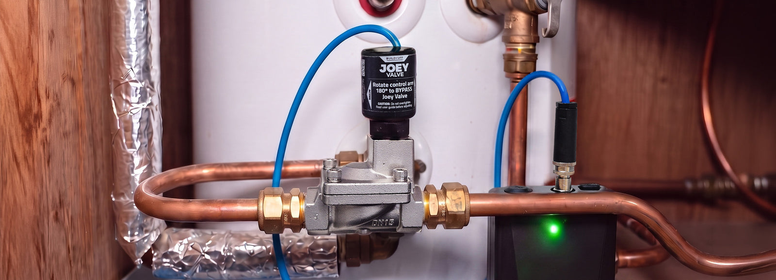 Joey Valve installed on the job, fitted to a water heater's copper pipe supply line