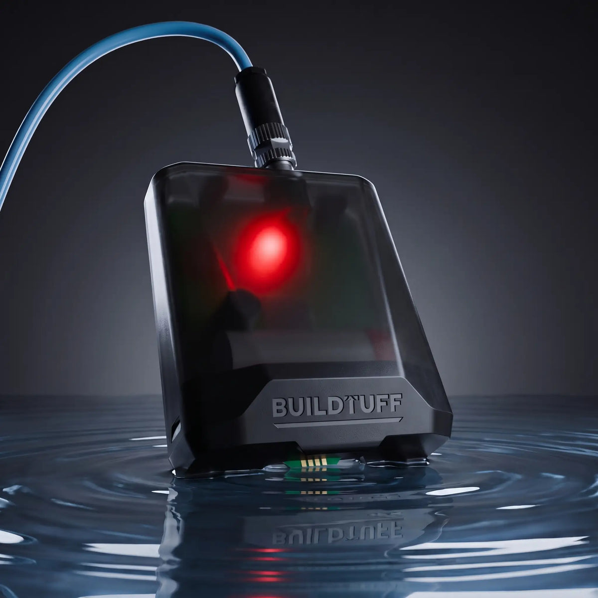 Joey Valve sensor detecting water on a dark background